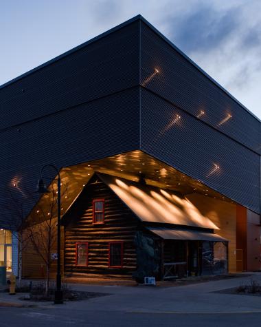 An angular building on a street corner