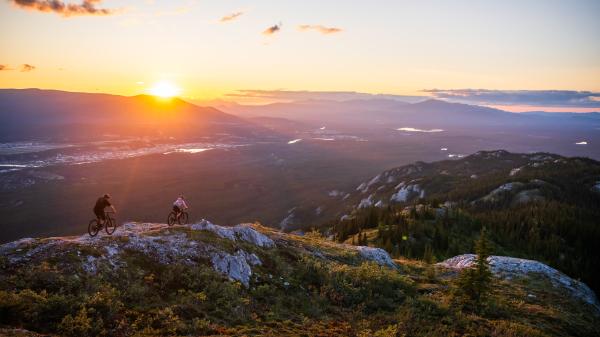 Sunset mountain biking on alpine singletrack on The Dream trail in Whitehorse.