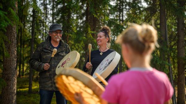 Kaska elder and artist Dennis Shorty and his wife Jenny Frohling singing and drumming at Dennis’ studio in Ross River.