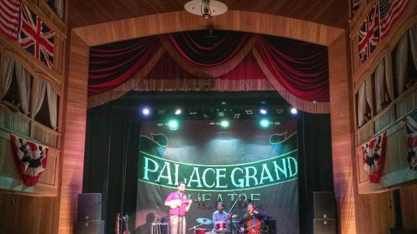 Palace Grand stage with performers