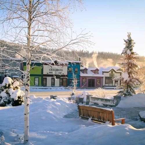Colourful buildings in Dawson City are covered in fresh snow