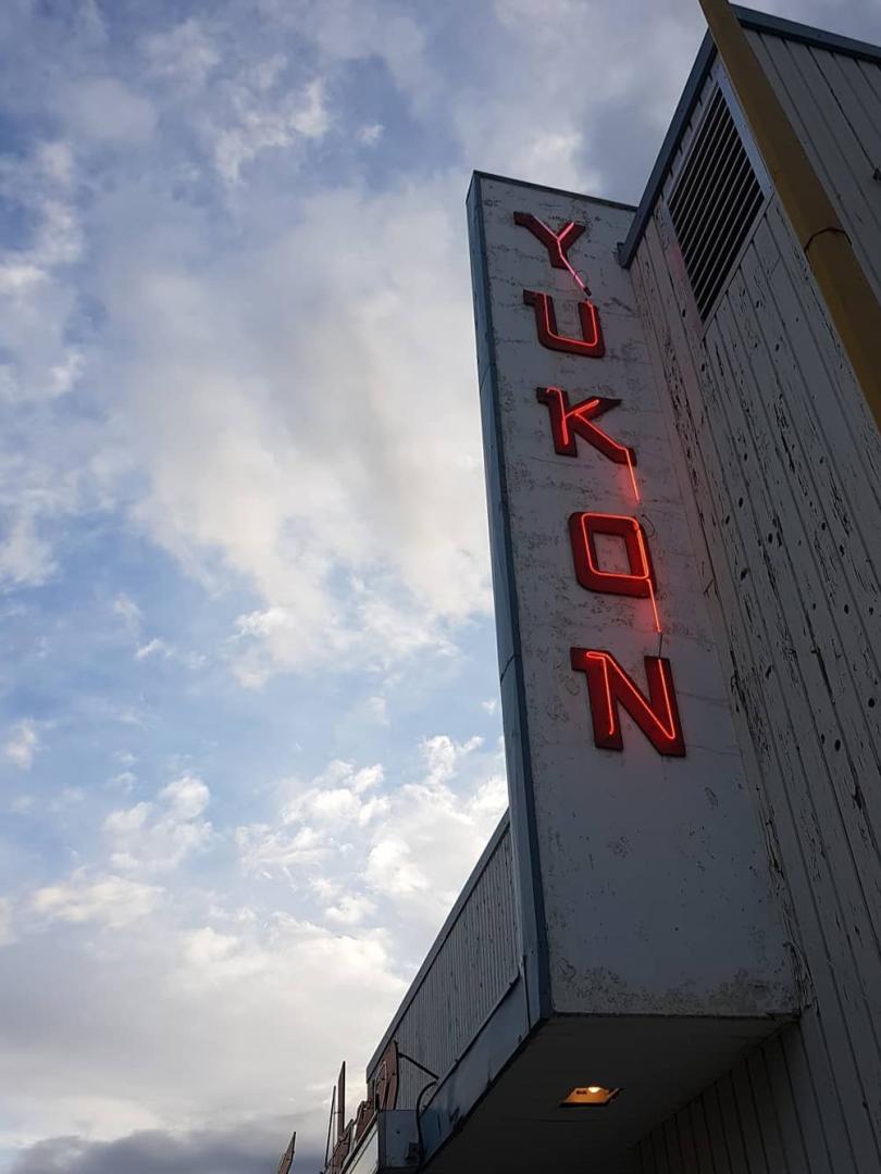 A red neon Yukon sign 
