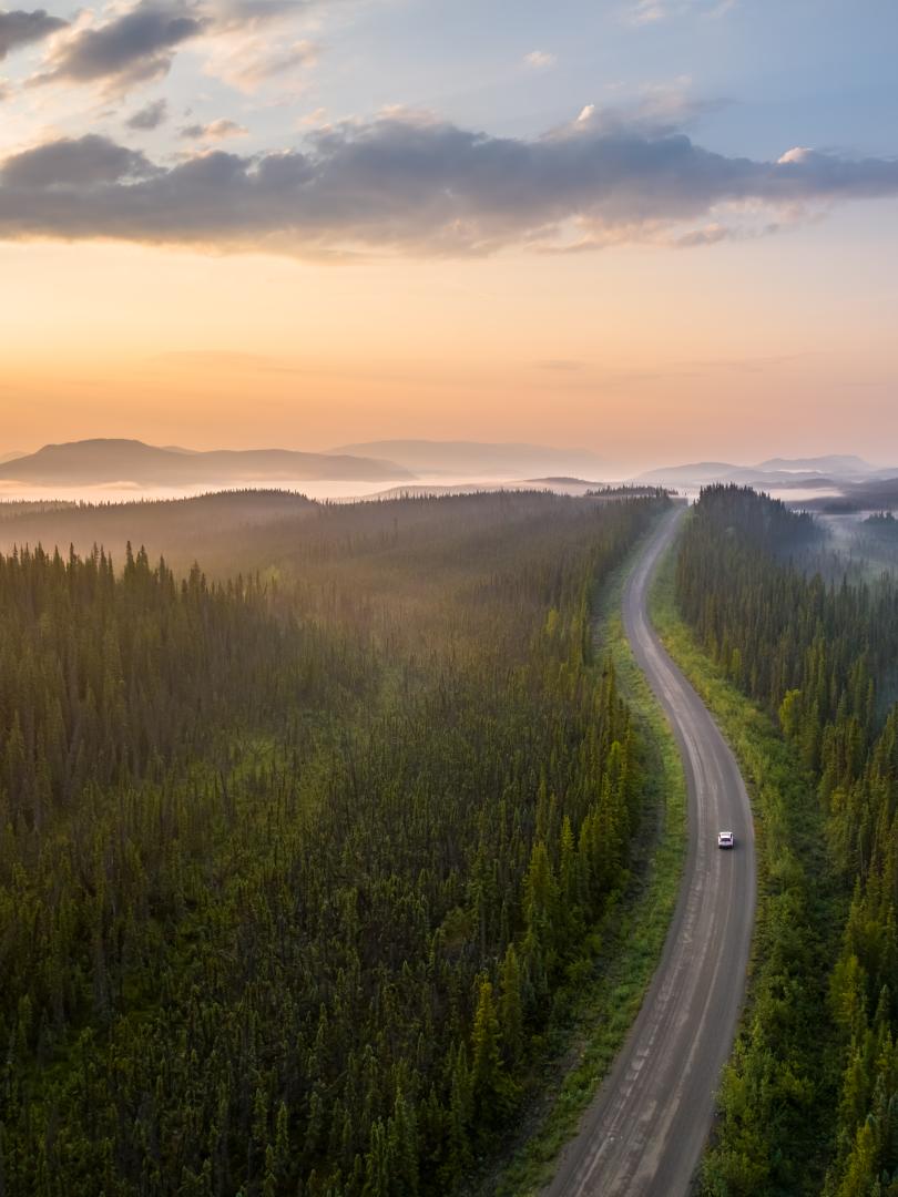 View of the road winding toward Kluane National Park, showcasing the stunning Yukon landscape.