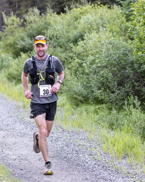 Raven50 runner on a gravel trail