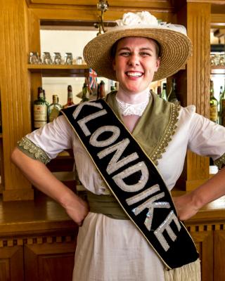 Parks canada staff dressed in garb from the gold rush era