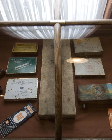 Museum artifacts laid out in a display